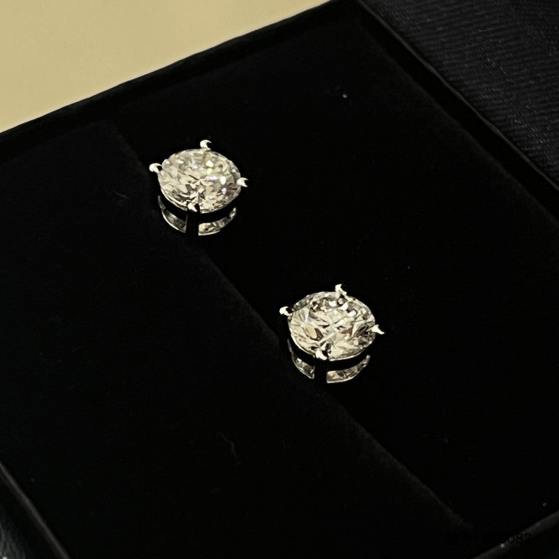 Four-Prong Round Diamond Stud Earrings